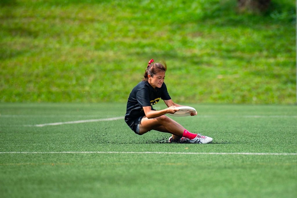 An image of a customer service representative sitting at a computer, with a speech bubble containing a positive message